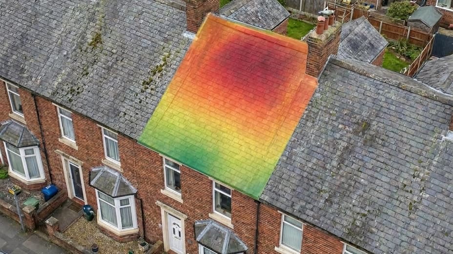 A UK terraced roof from above with a solar potential heat map over one section.